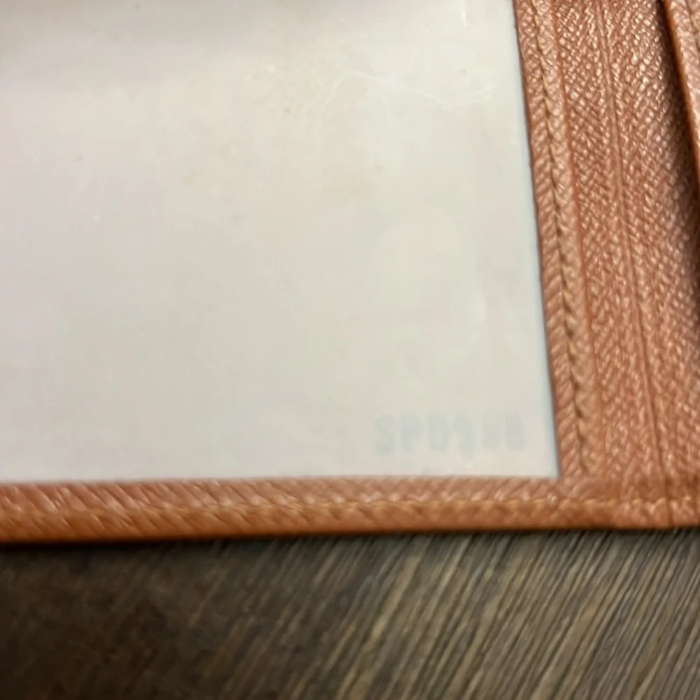 Authentic Louis Vuitton brown taiga leather bifold card I.D. Holder